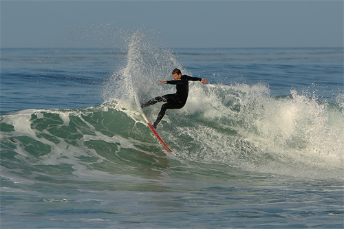 Surfer riding a wave